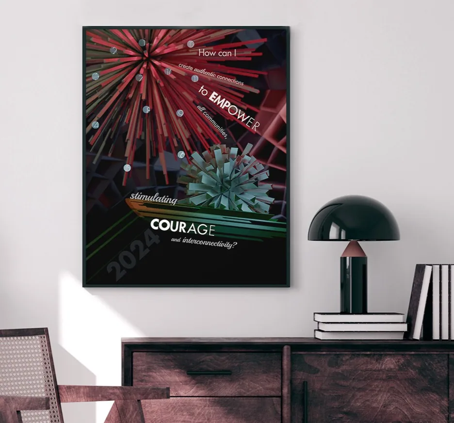 Calling Intention poster framed above a sideboard with a lamp